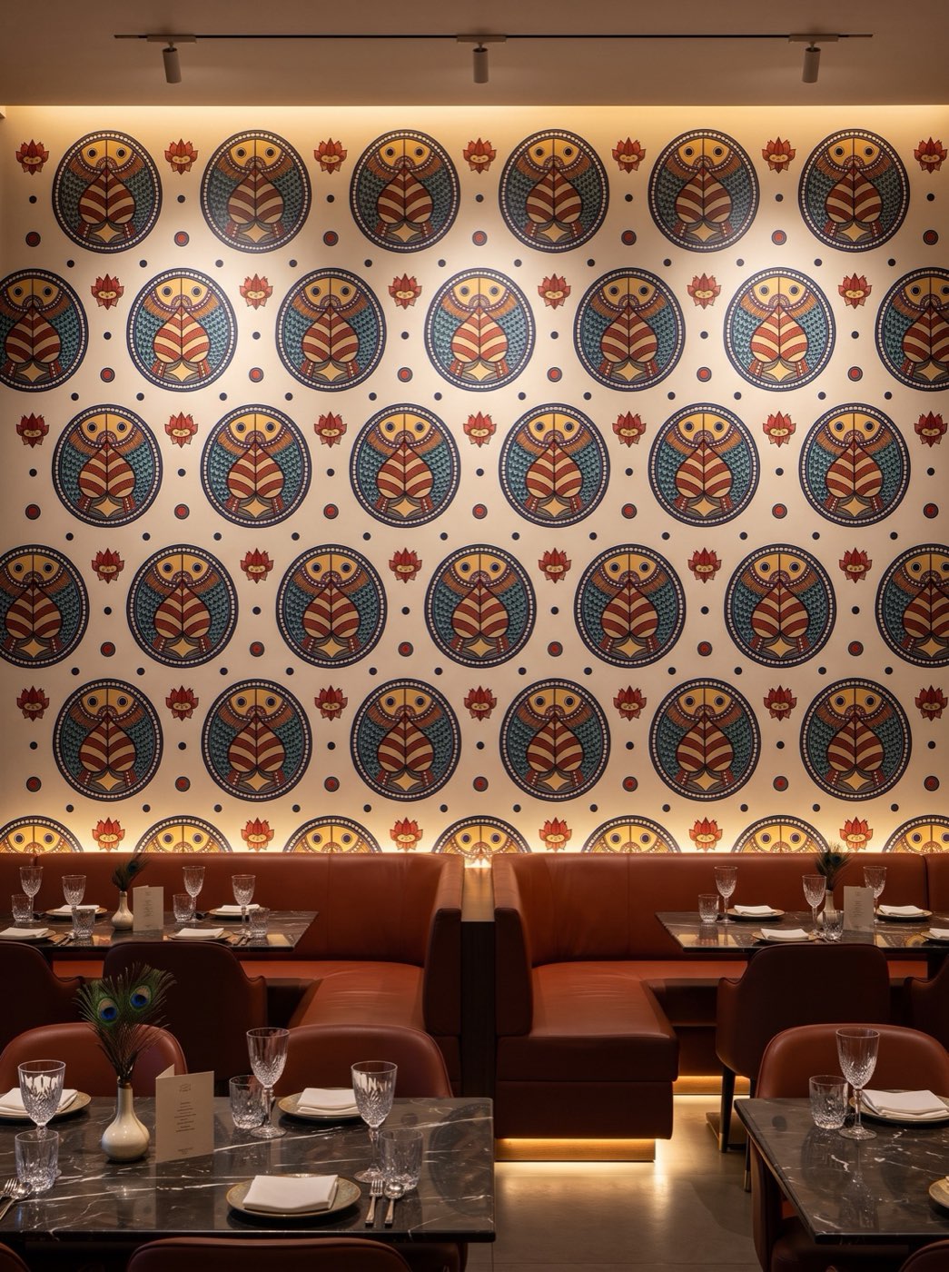 High-spec digital acoustic wallcovering in indigo, terracotta and ochre for a fine-dining interior.